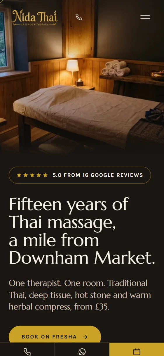 Nida Thai Massage website on a phone